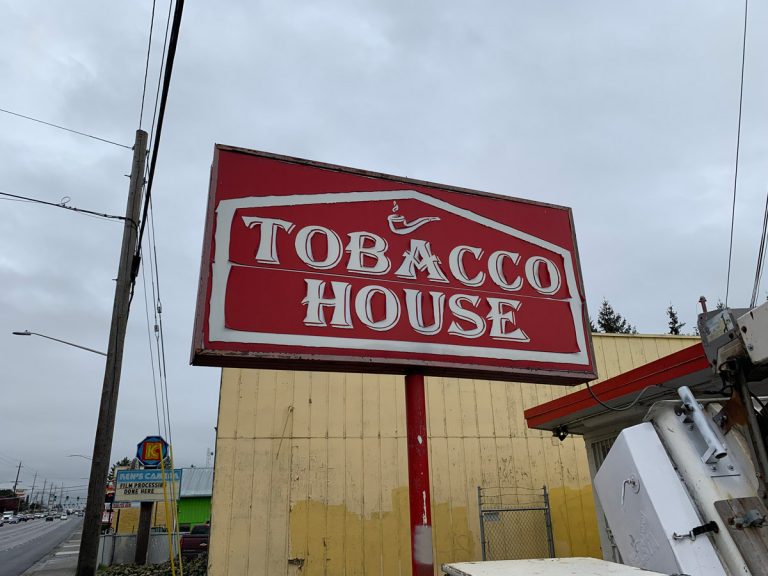 Pole sign work with a bucket truck in Everett, WA (before)